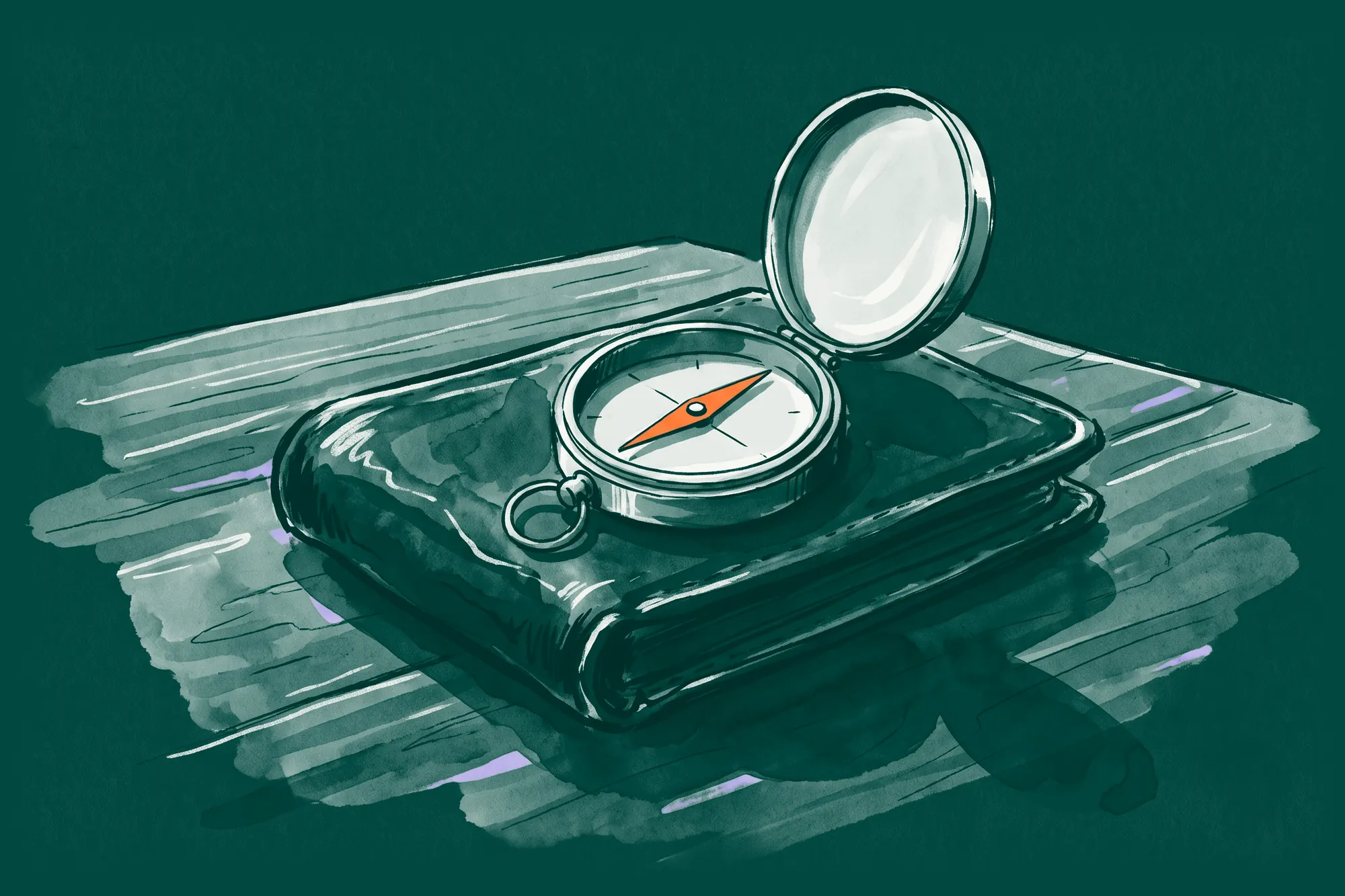 A pocket compass lying open on a closed leather wallet, its needle in orange.